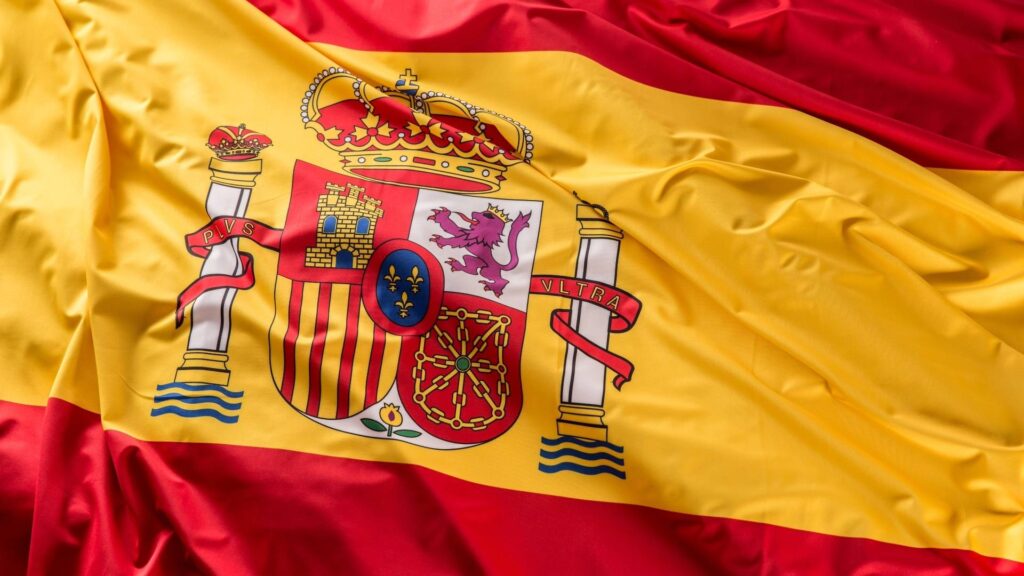 Spanish flag symbolizing property ownership and the process of Buying Real Estate in Spain as a foreigner