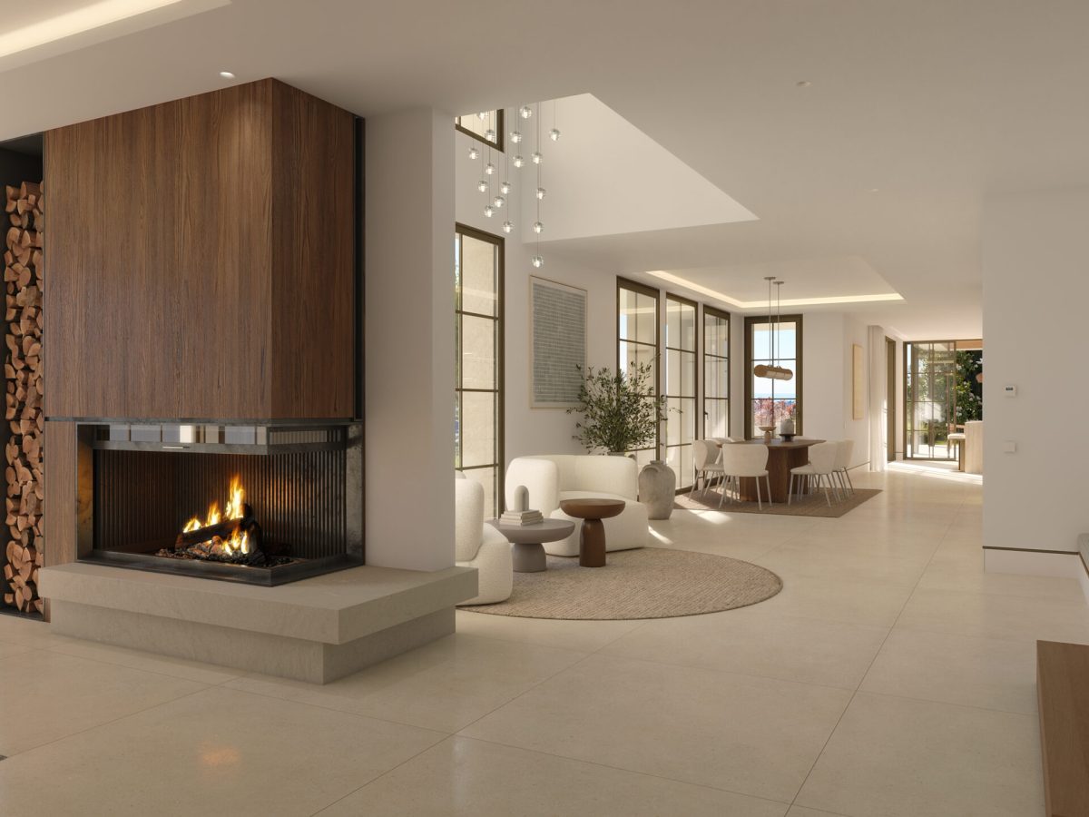 Double-height living room with fireplace and terrace access in luxury villa at Marbella Club Golf Resort Benahavís