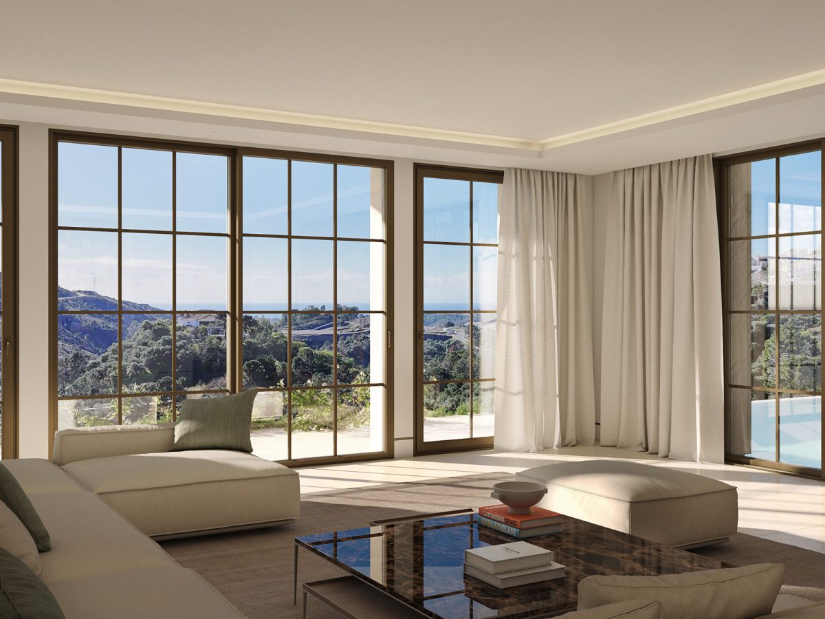 Spacious living room in El Quejigal Villa, Marbella Club Golf Resort Benahavís with panoramic sea and mountain views.