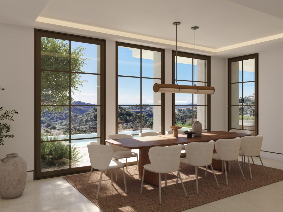 Elegant dining room in El Quejigal Villa, Marbella Club Golf Resort Benahavís with panoramic mountain and pool views.