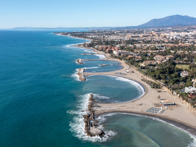 aerial view of the beach and landscape in Nueva Andalucia, —Quintessentia Property Advisors